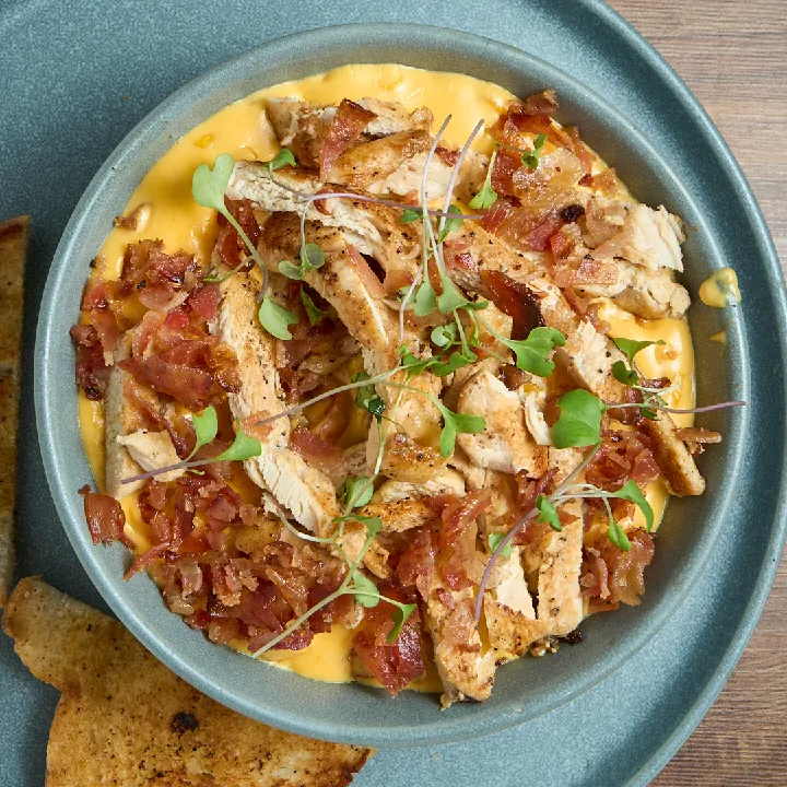 Desgranado Bañada en Salsa de Queso