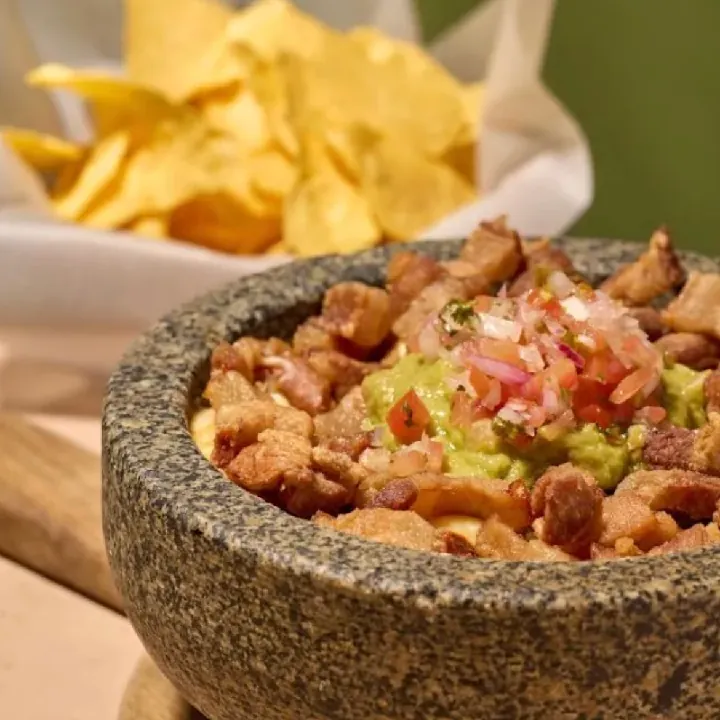 Chicharrón Nachos with Gratinated Meat
