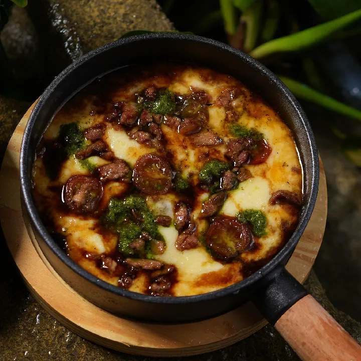 Provoleta con Chorizos Calados