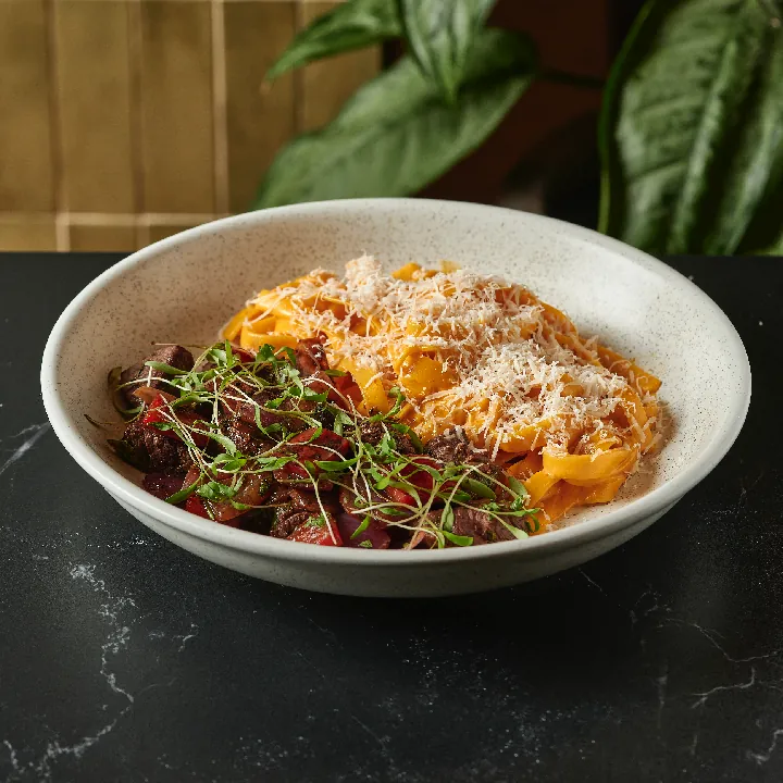 FETUCCINI HUANCAINA Y LOMO SALTADO