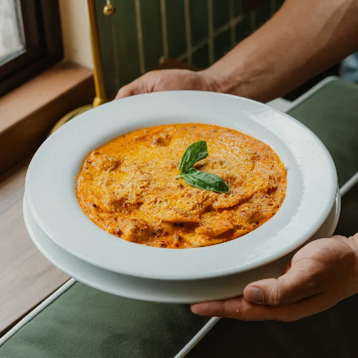 Meat ravioli in Bolognese sauce
