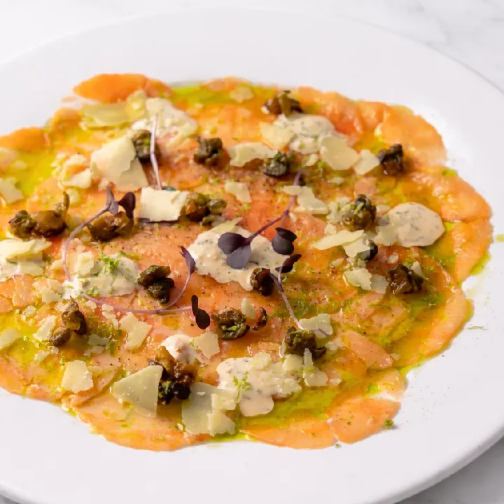 Salmon carpaccio with lemon